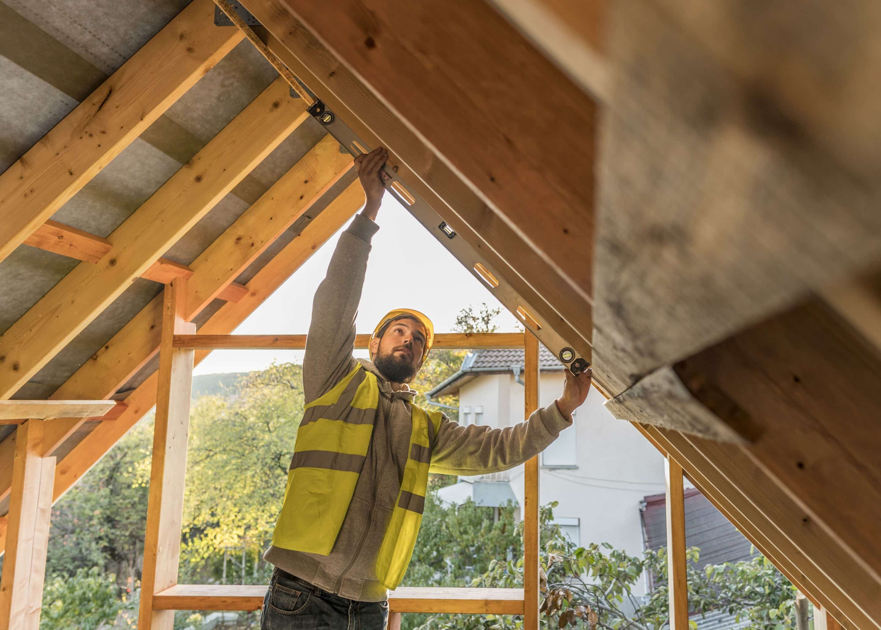 carpenter man working roof scaled